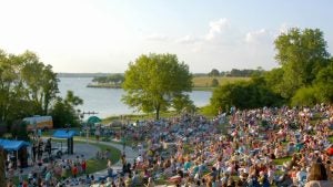 people seating near the lake